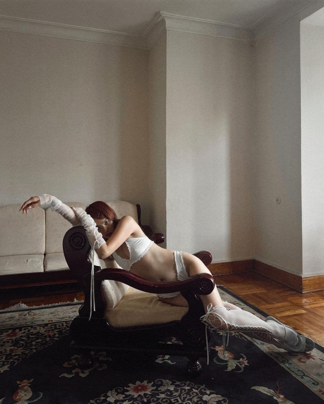 model on a chair