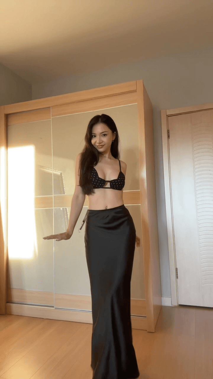 model standing with long skirt